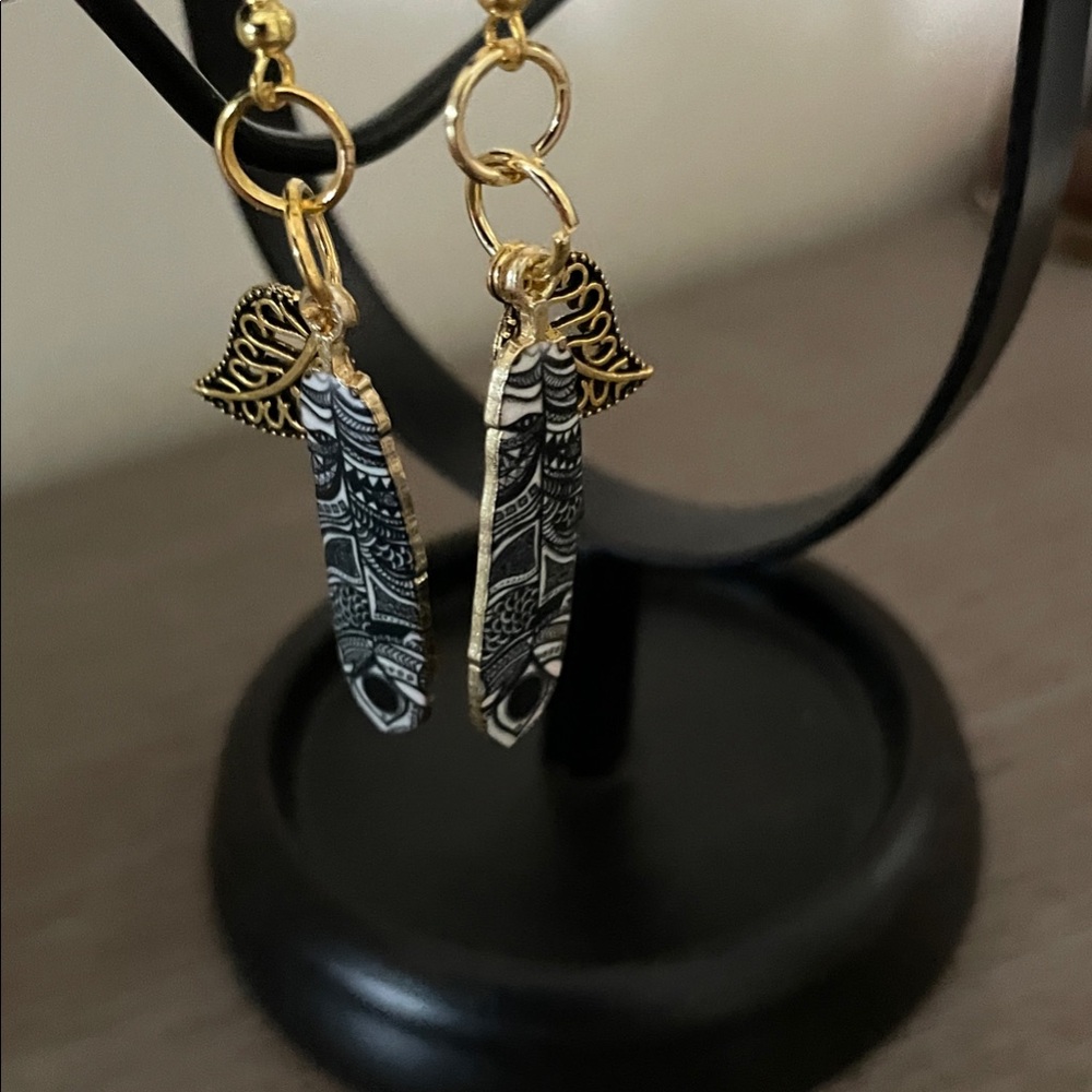 Elegant Gold and Black Dangle Earrings